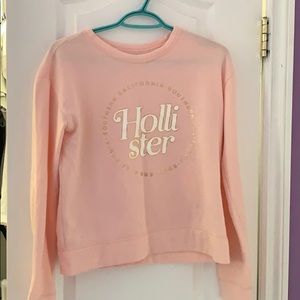 pink hollister crew neck sweater